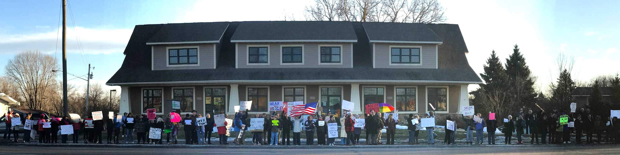 One of the many protests Caren Gallagher organized in 2018 when Rep. Jason Lewis refused to hold town halls or meet with constituents. This was outside of his local office.